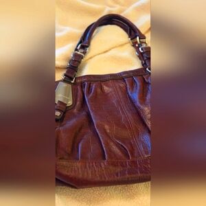 B Makoswky. Elegant Burgundy Leather Handbag